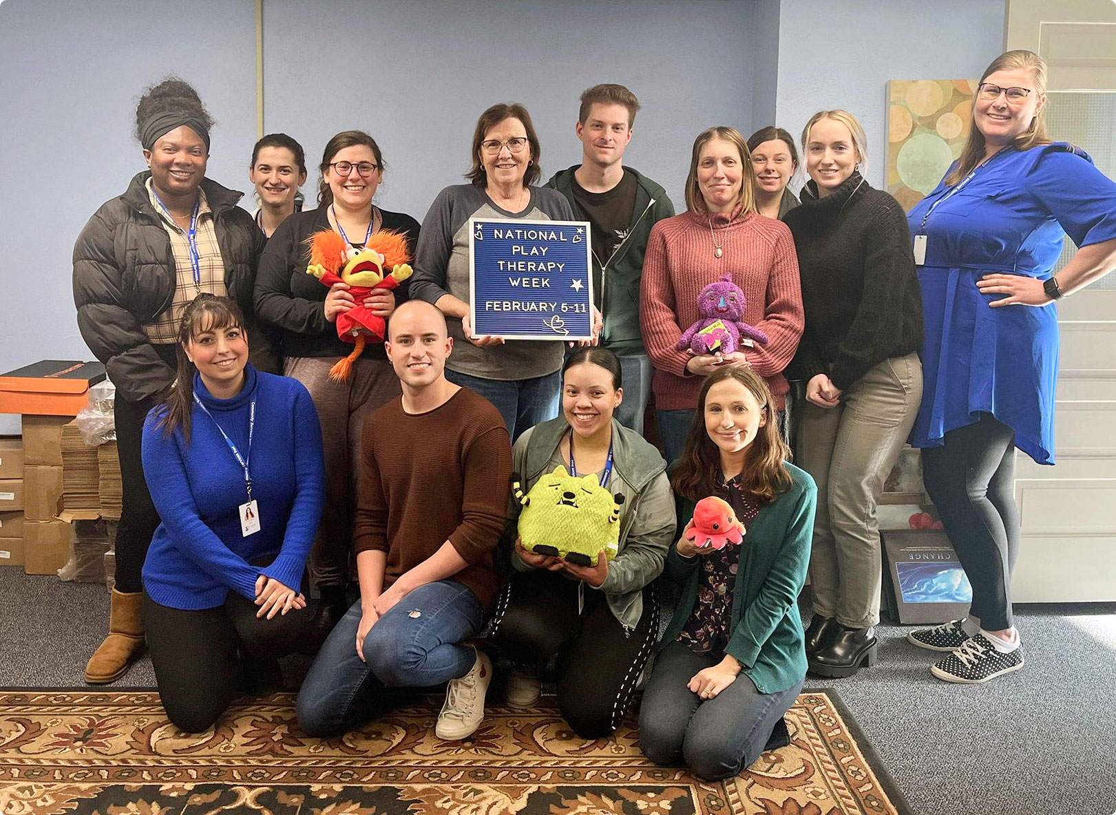 Team celebrating play therapy week.